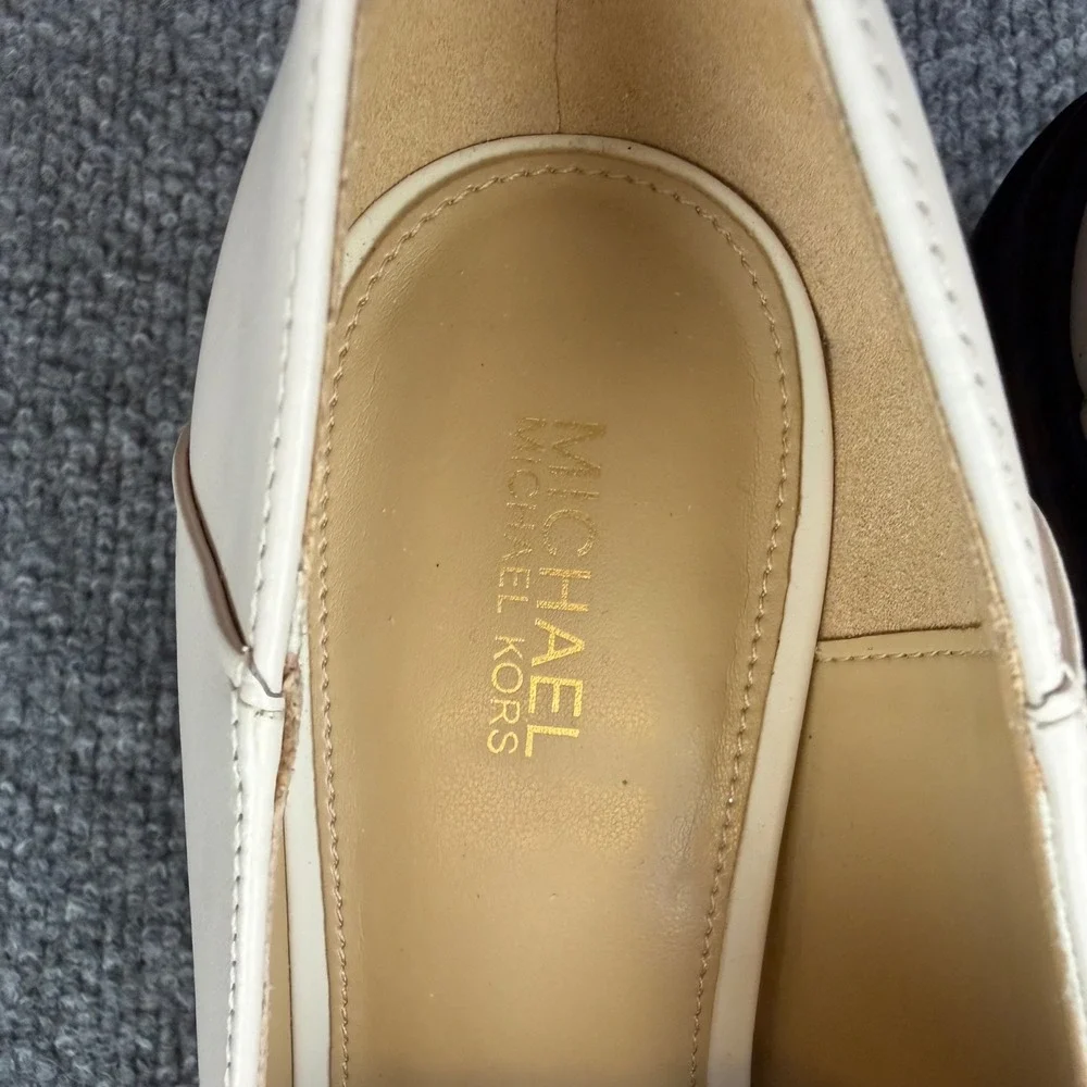 Michael Kors business approx academia